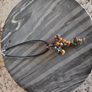 Elegant Silver and Brown Cross Pendant Necklace